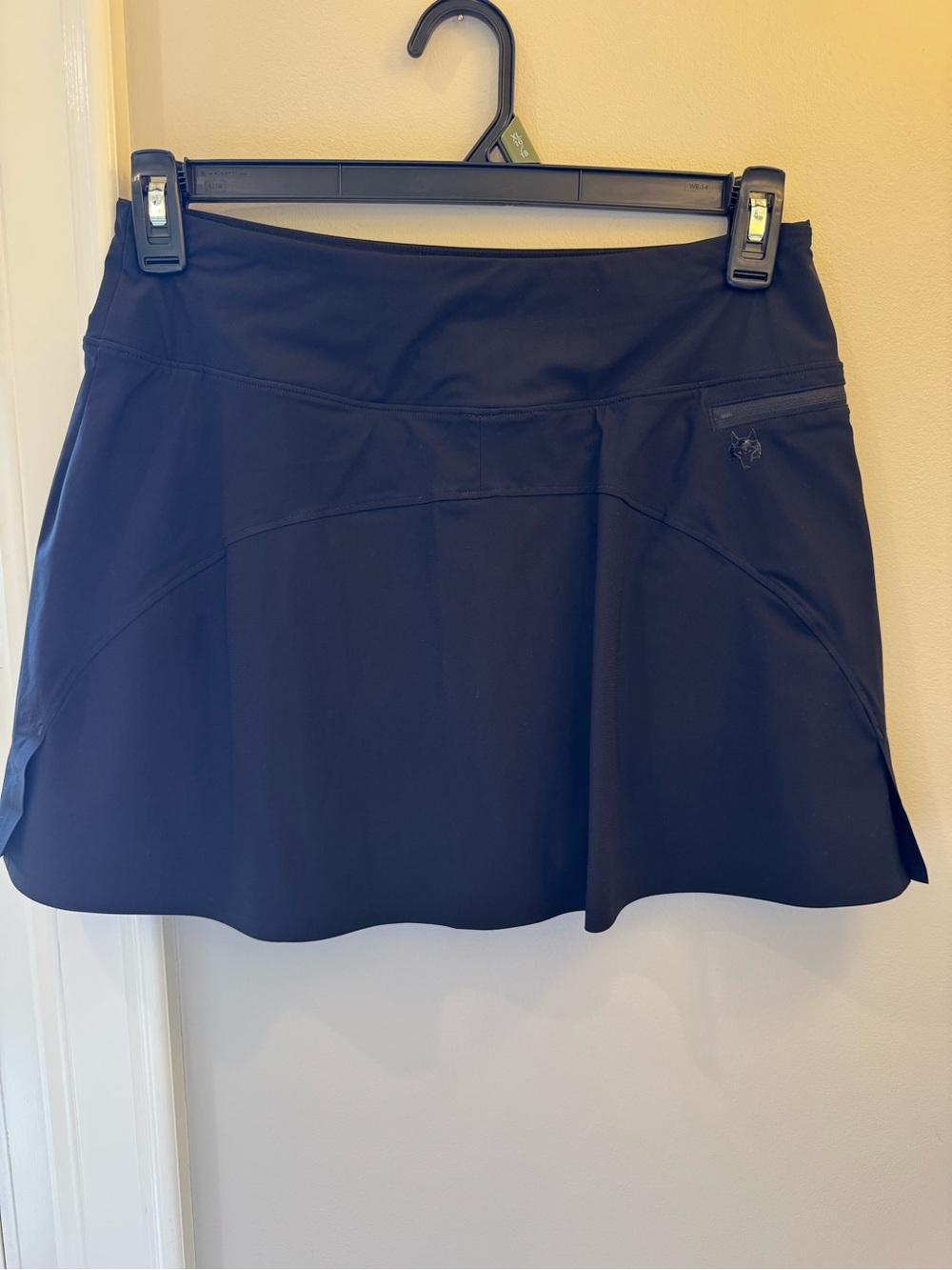 Greyson Black Performance Skort with Subtle Tag Detail